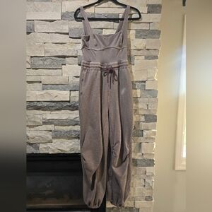 FLAW!!!!! . FP Movement Women's Inbound Onesie Sz Small Brown